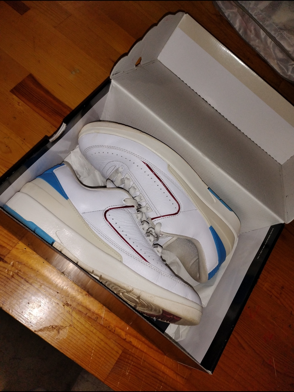 Jordan White Sneakers with Blue Heel and Red Trim